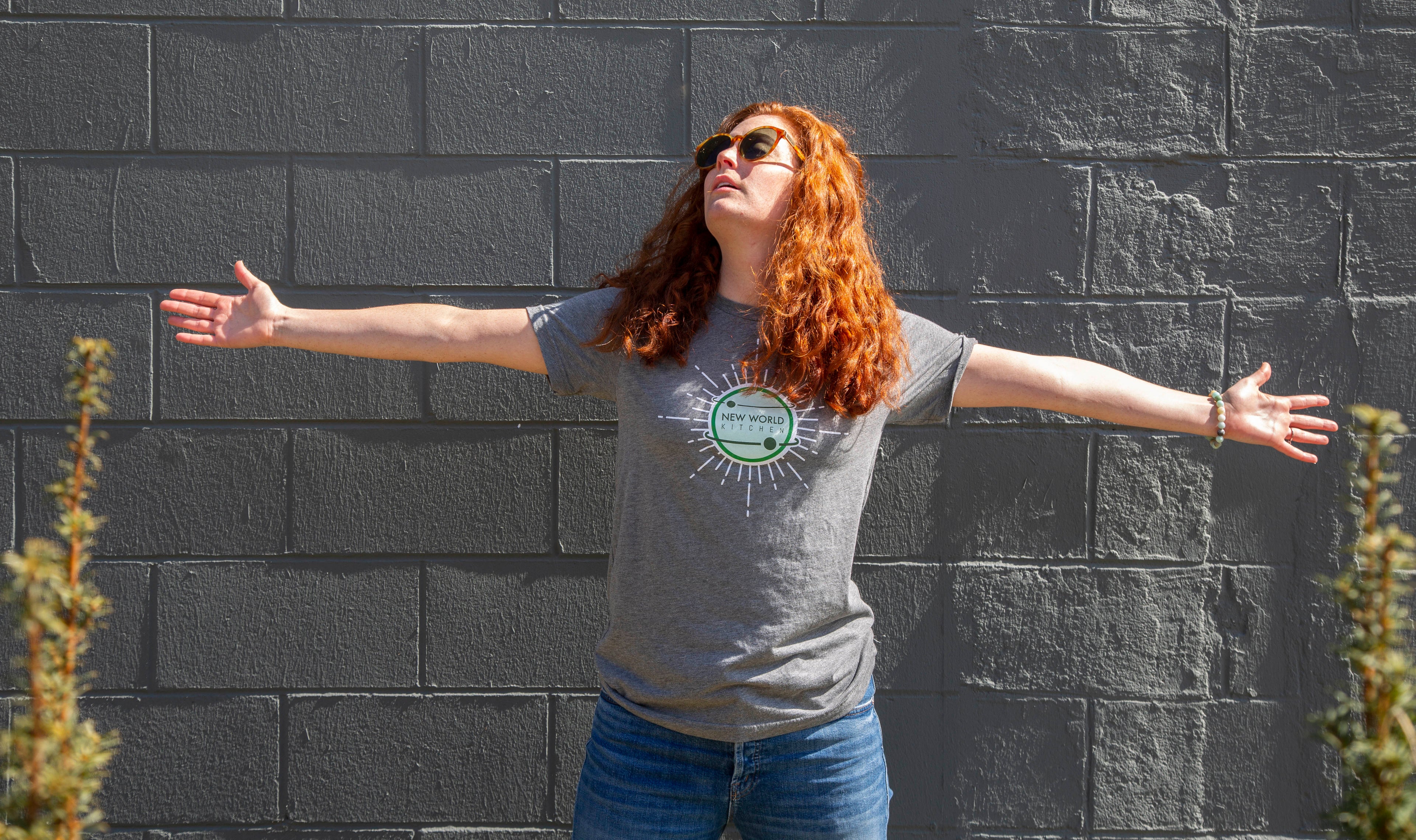 Blair Ryan models a New World Kitchen t-shirt from The Side Garage in Des Moines, Iowa