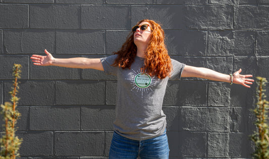 Blair Ryan models a New World Kitchen t-shirt from The Side Garage in Des Moines, Iowa