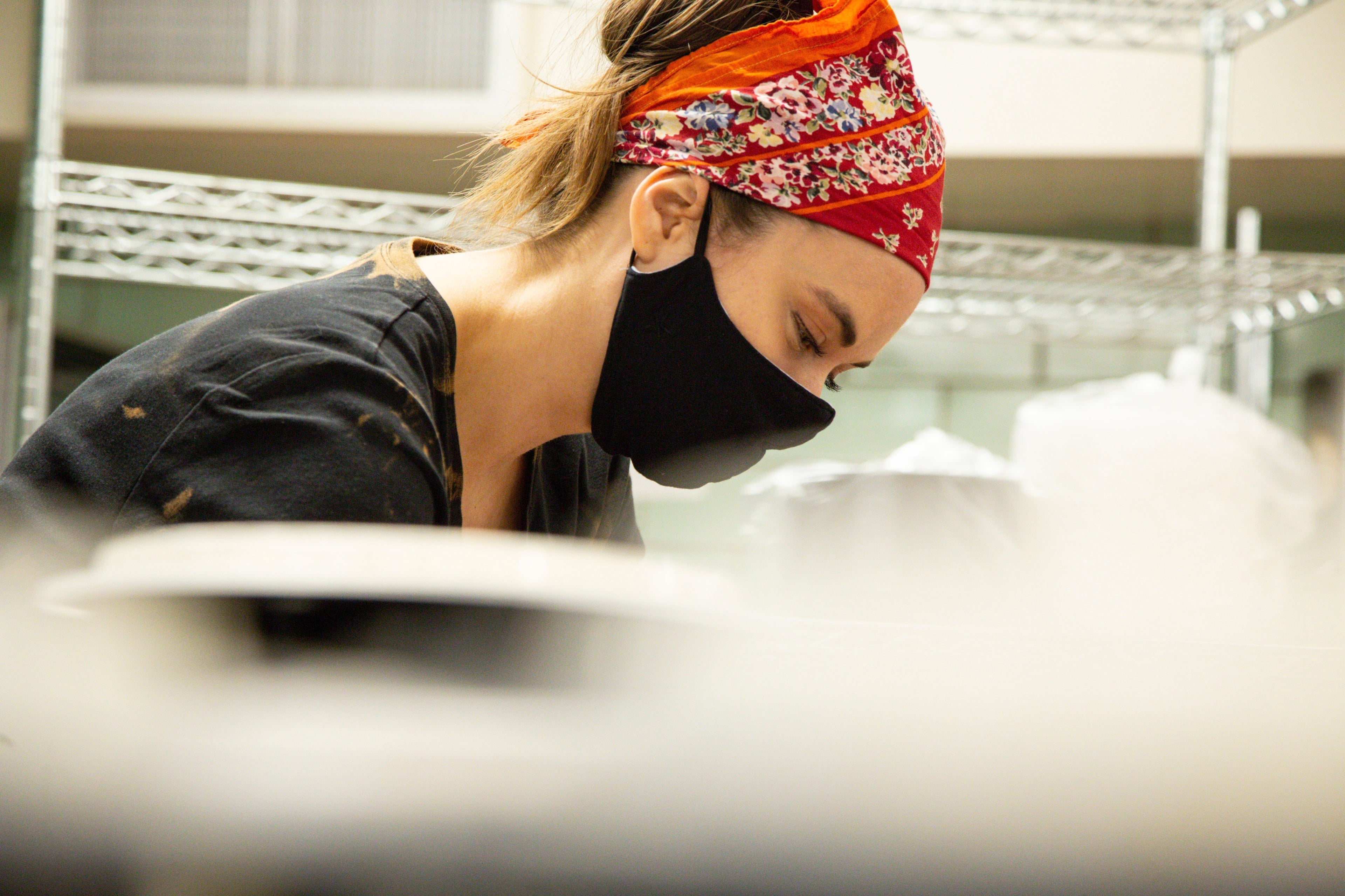 Chef Madeline Krantz working at New World Kitchen in Des Moines, Iowa