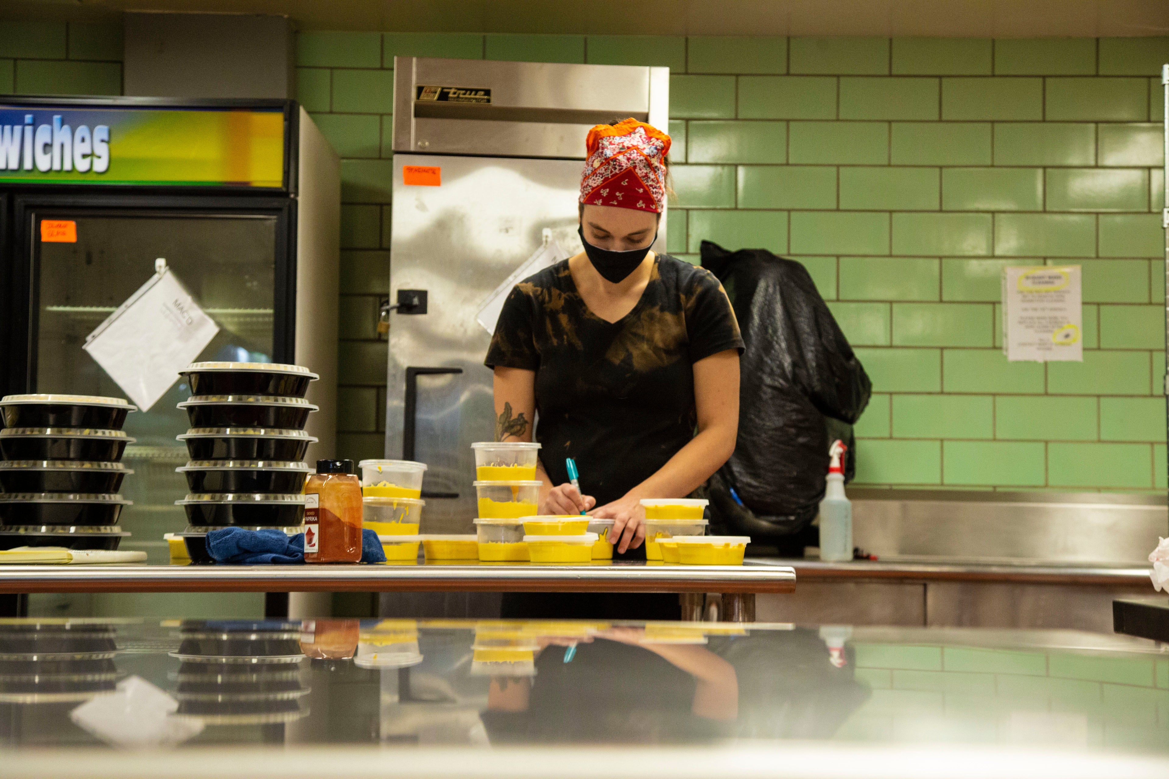 Chef Madeline Krantz working at New World Kitchen in Des Moines, Iowa