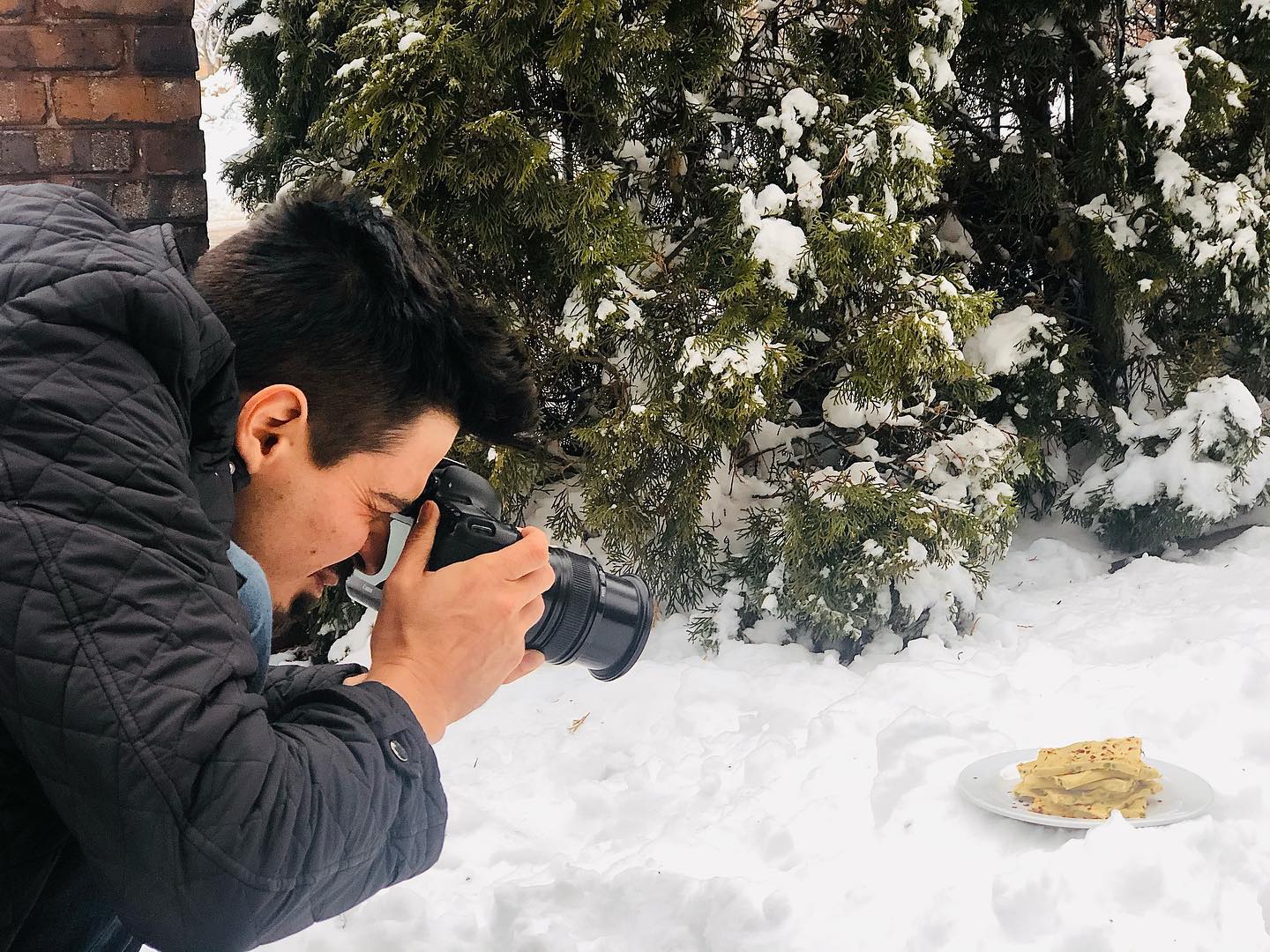 Photographer Justin Norman takes a picture of vegan pepper jack cheese slices in Des Moines, Iowa