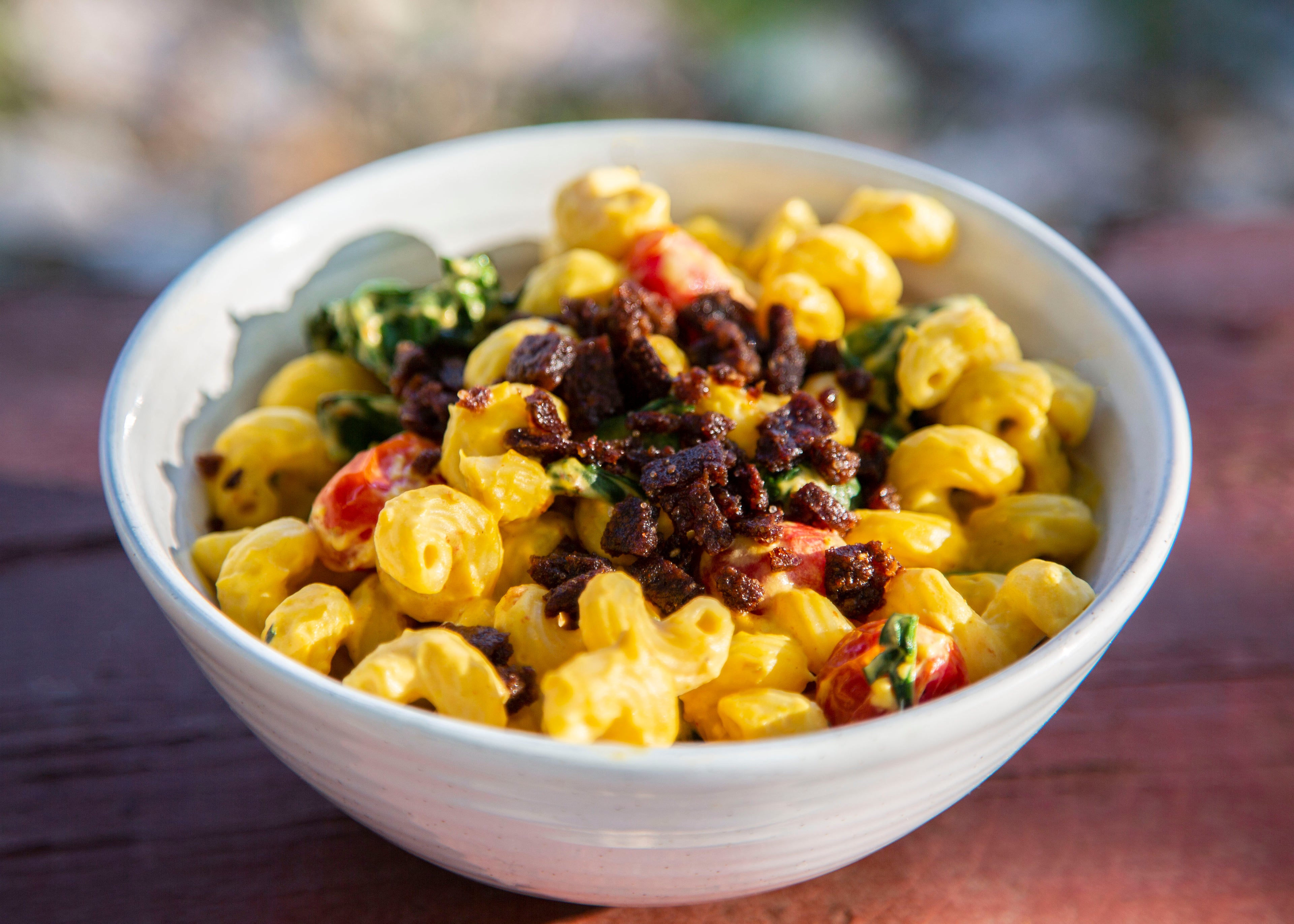 Dairy-free macaroni and cheese with vegan & vegetarian plant-based bacon bits in Des Moines, Iowa